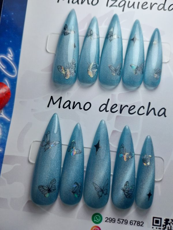 L - Mariposas negras